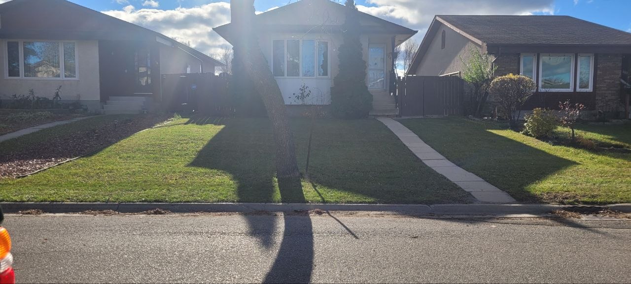 Freshly maintained front lawn by KMM Property Maintenance